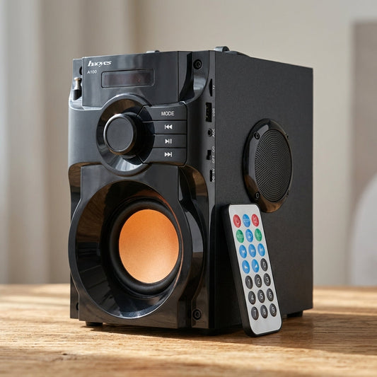 Macro shot of the A100 wireless subwoofer showing textured front grille and sleek enclosure with soft lighting.